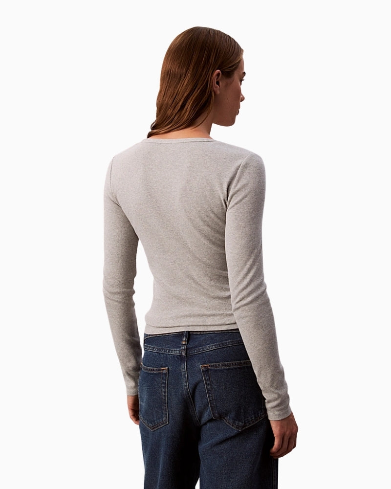 Back view of slim cotton Calvin Klein top with long sleeves and soft fit