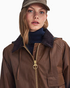 Close-up of detachable hood and front zip detail