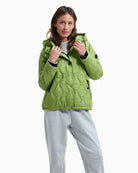 District Valmorel apple green jacket showing lightweight fabric and stitching