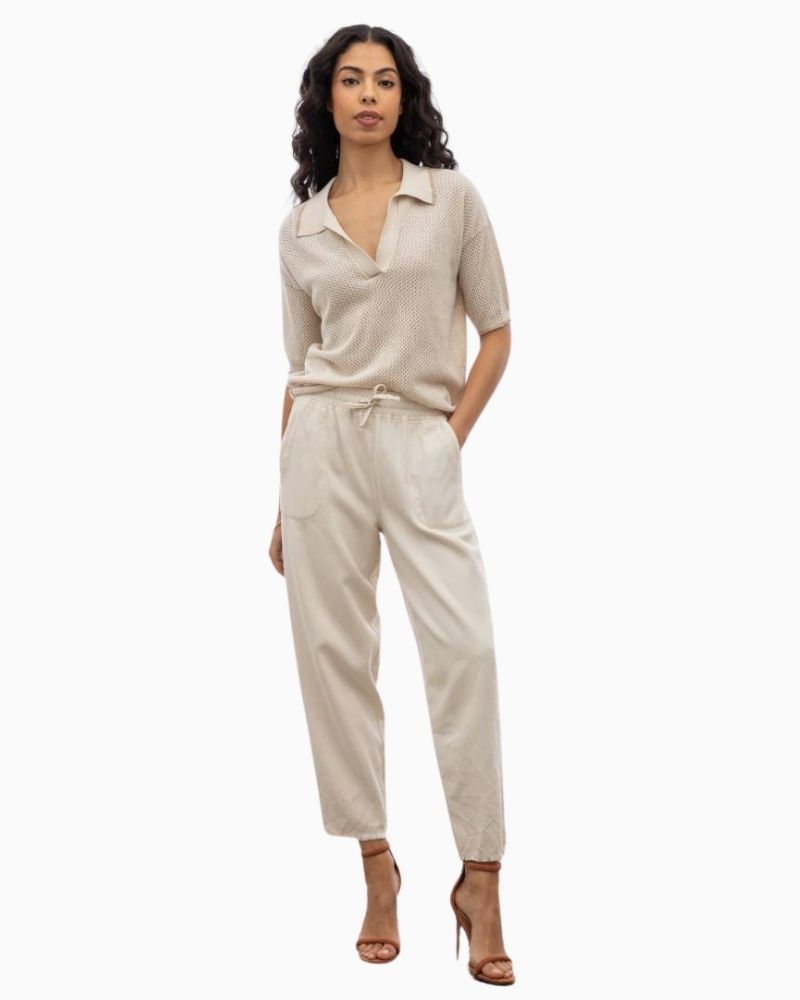 Eva Kayan ivory jogging pants with drawstring waist and fringed hems
