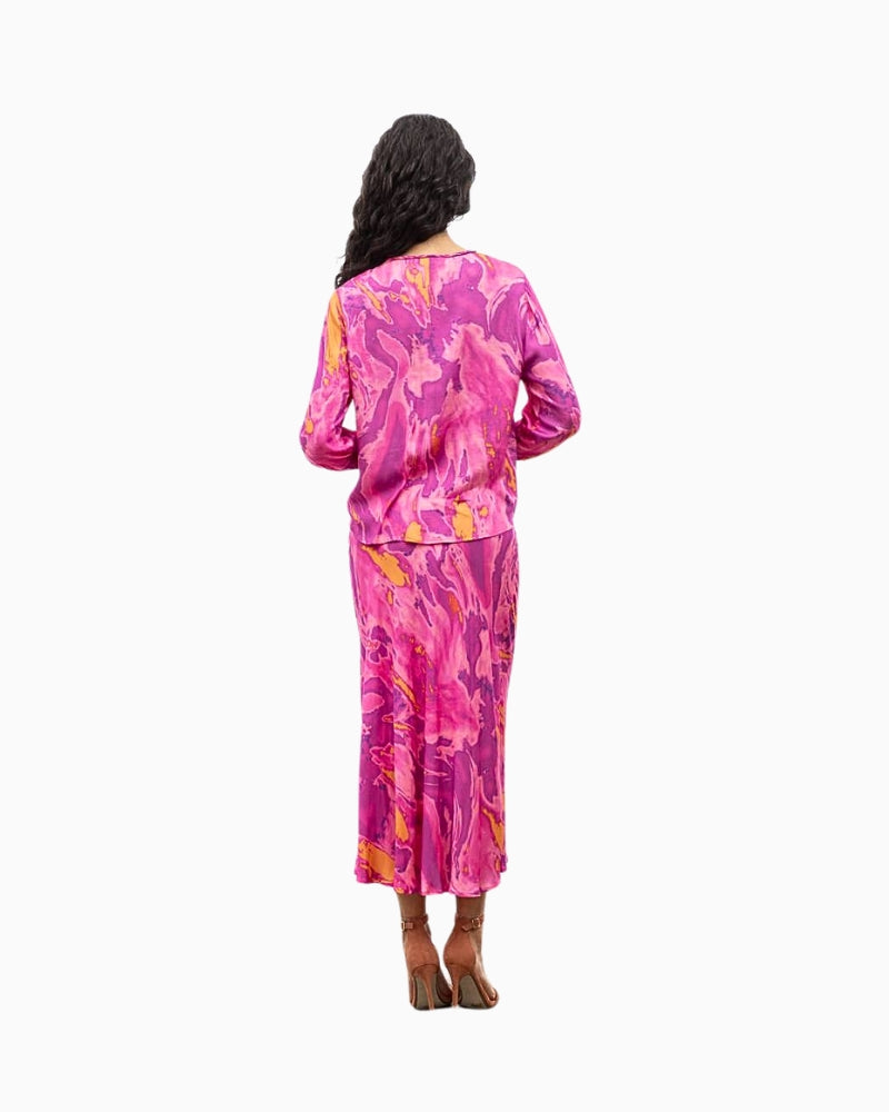 Back view of Eva Kayan blouse in soft amethyst tie dye print