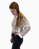 Side view of Eva Kayan jacquard knit showing relaxed straight fit and rounded armholes