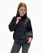 Dark grey roll neck jumper by Eva Kayan with subtle metallic shimmer