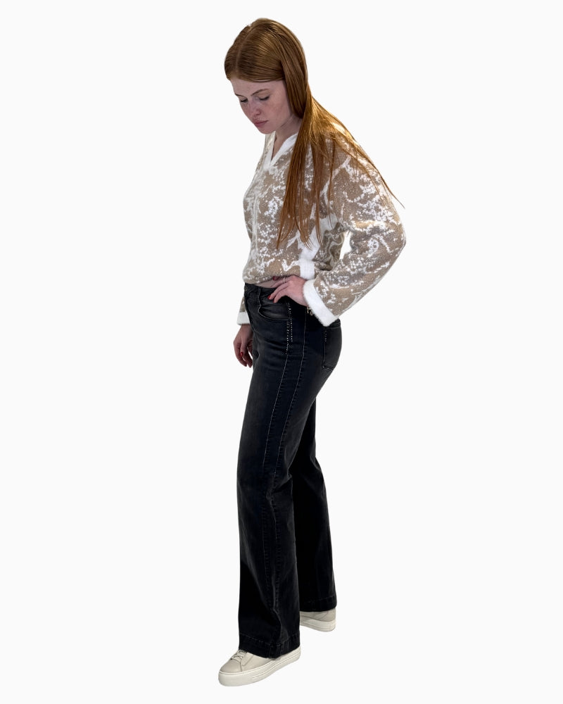 Side view of the wide-leg jeans, showing the straight cut and relaxed fit.