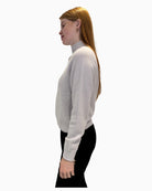 Side view of cream Faber wool-cashmere jumper with relaxed fit