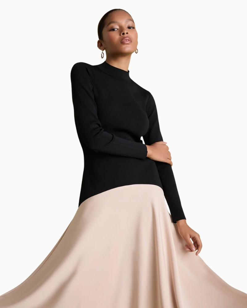Florere Acacia Curved Seam Midi Dress in Black/Cream curved seam detail