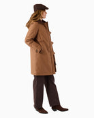 Frandsen Parka Jacket in tan worn side view with angled pocket