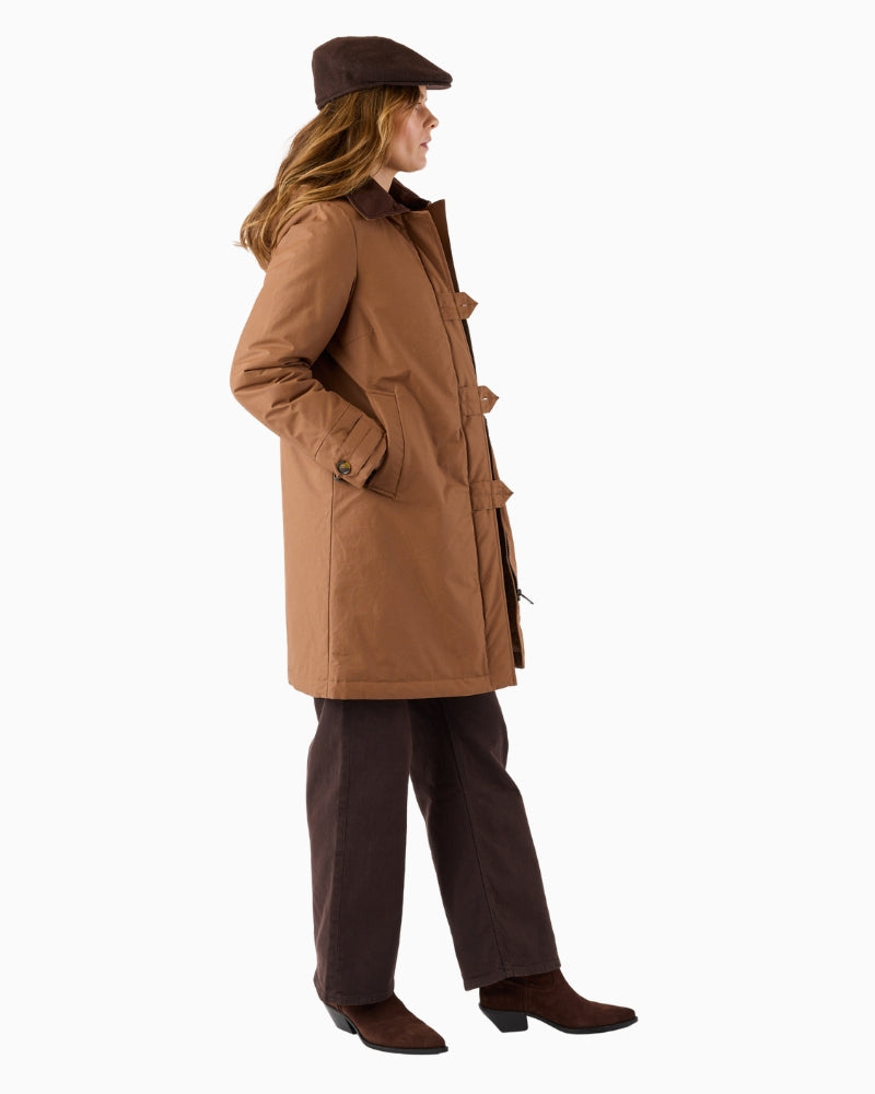 Frandsen Parka Jacket in tan worn side view with angled pocket