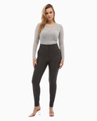 Freddy black leather-look trousers styled with heels 