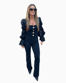 Freddy high-waisted flared pants styled with blouse and blazer