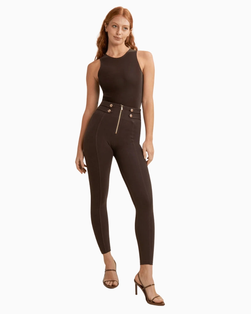 Front view of sculpting pants with military button detail and zip