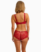 Back view of red Freya bra with supportive mesh band and adjustable straps