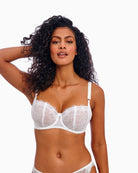 Model wearing white floral lace bra 