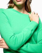 Close-up of fine knit texture and ribbed cuff detail