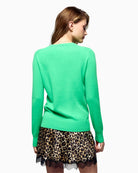 Back view of GCS-certified cashmere jumper showing clean ribbed hem