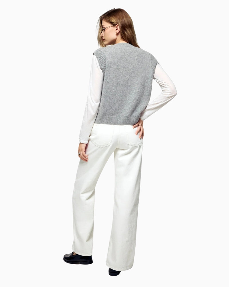 Back view of sleeveless cashmere sweater showing ribbed trim