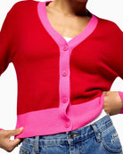 Close-up of two-tone edges on From Future hot red cashmere cardigan