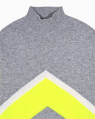 Detail of sleeve showing colour block design and fine cashmere weave