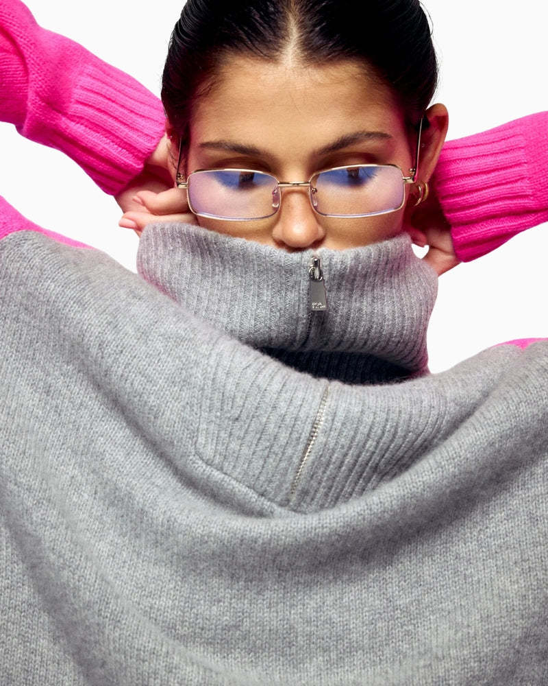 Close-up of zip neckline and fine cashmere texture