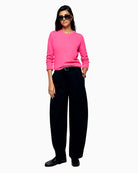 Styled look of women’s From Future cashmere sweater paired with black jeans