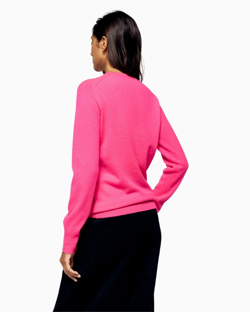 Back view of pink cashmere sweater with crew neckline