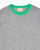 Crewneck detail showing fine knit texture and soft cashmere finish