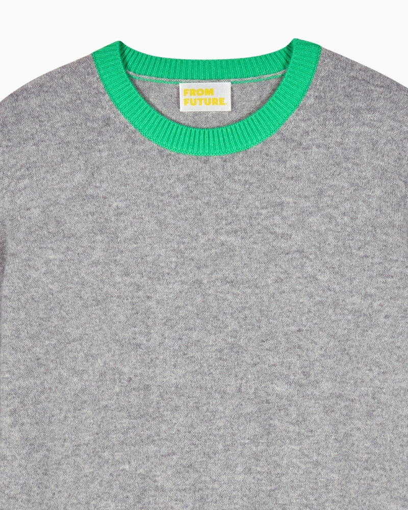 Crewneck detail showing fine knit texture and soft cashmere finish