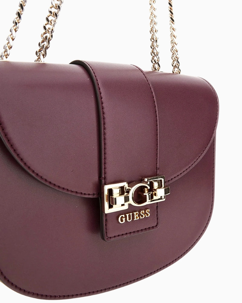 Side view of GUESS Jane shoulder bag showing smooth finish
