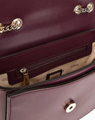 Interior of GUESS Jane bag with zip pocket and lining