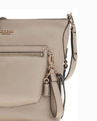 GUESS Marsha handbag gold hardware and logo detail 