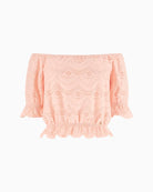 GUESS_Off_Shoulder_Eyelets_Top_in_peach_flat_lay_front_view