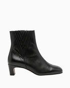 Gaimo Ankle Boot in black side view with low block heel and V-shaped detailing