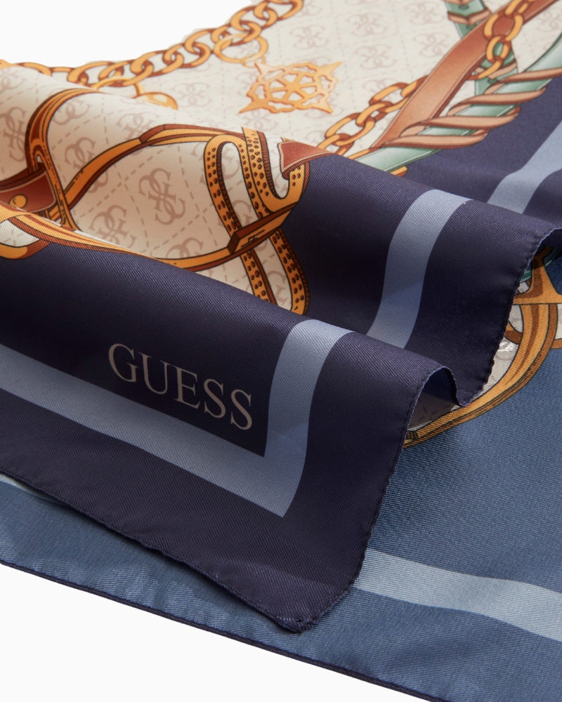 Flat lay of Guess blue logo scarf with bold print and elegant finish