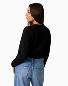 Back view of Guess cable knit with classic cable stitching and regular fit