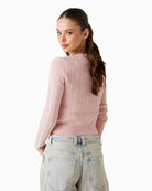 Back view of pink Guess sweater with ribbed hem and cuffs