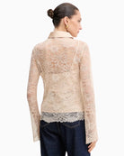 Back view of Guess lace blouse with straight fit and long sleeves
