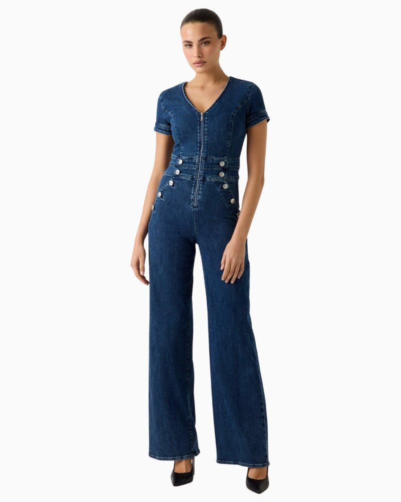 GUESS denim wide leg jumpsuit blue front view on woman – Áines Boutique