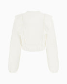 Back of Guess white cotton blouse with floral embroidery and ruffled shoulders