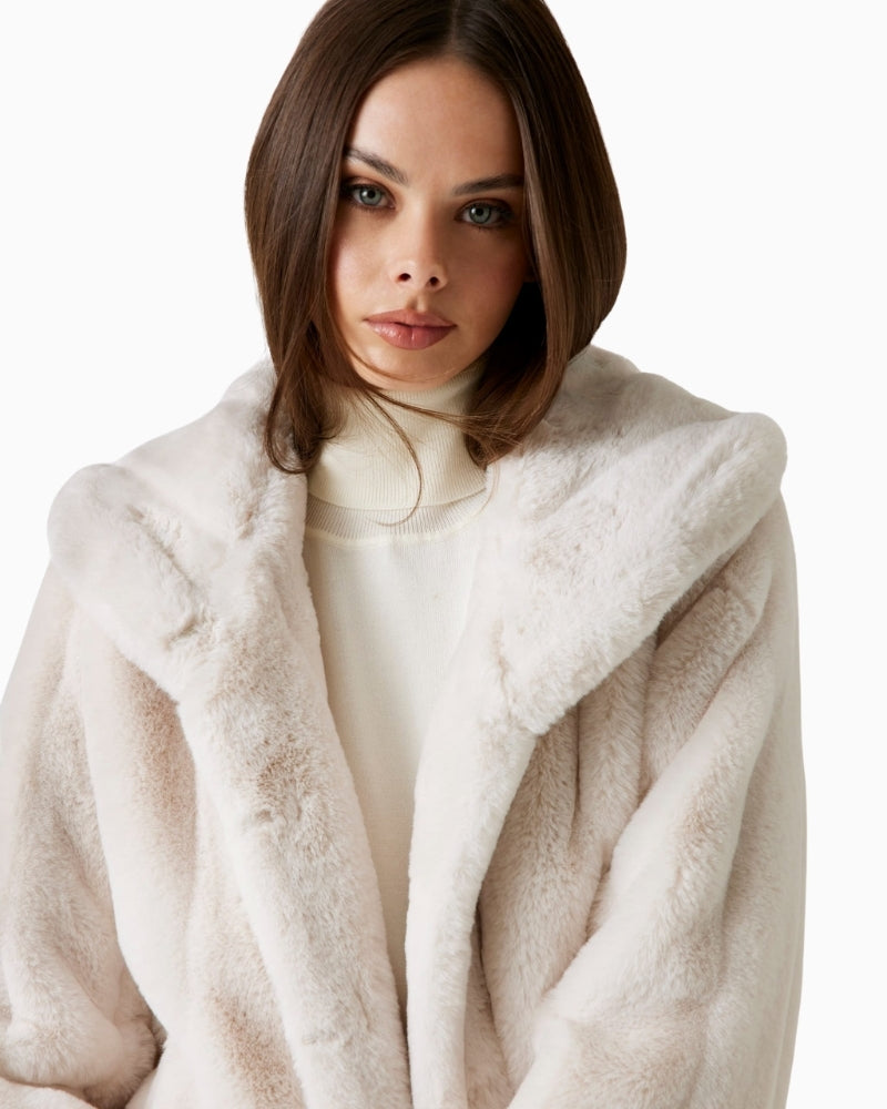 Close-up of collar detail on Guess faux fur jacket in neutral beige