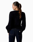Back view of soft cropped Guess sweater showing regular fit