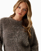 Cropped fuzzy jumper in brown with subtle sparkle, designed by Guess