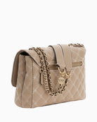 Guess Giully beige quilted bag angled side view – Áines Boutique