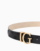 Close-up of debossed 4G and peony logo detail on black belt