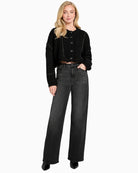 Model view of long-sleeve cardigan with soft knit texture