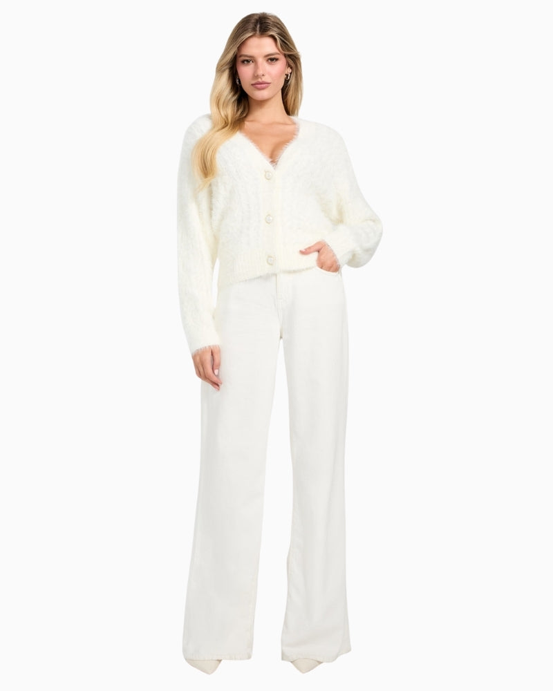 GUESS women’s knit cardigan styled with jeans for a cosy everyday look