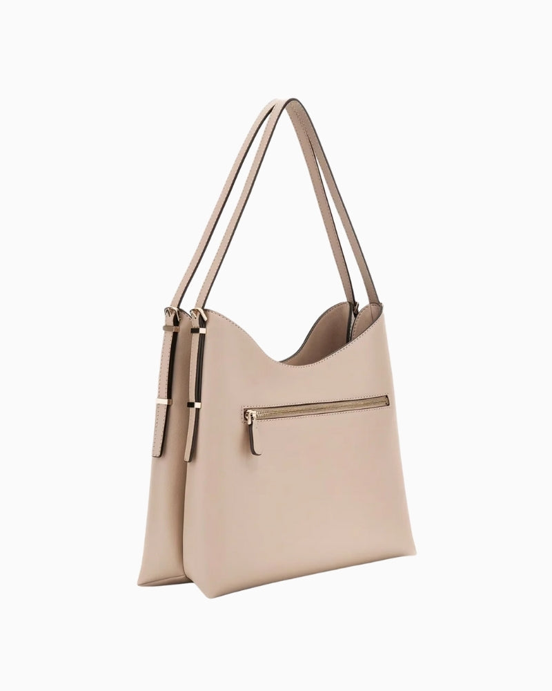 Side profile showing depth and flat base of Guess PU tote bag
