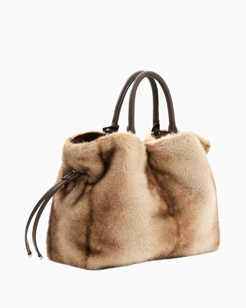 Back of Guess faux fur handbag in beige with soft textured finish