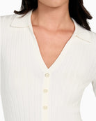 GUESS Miranda top showing slim fit and front button detail