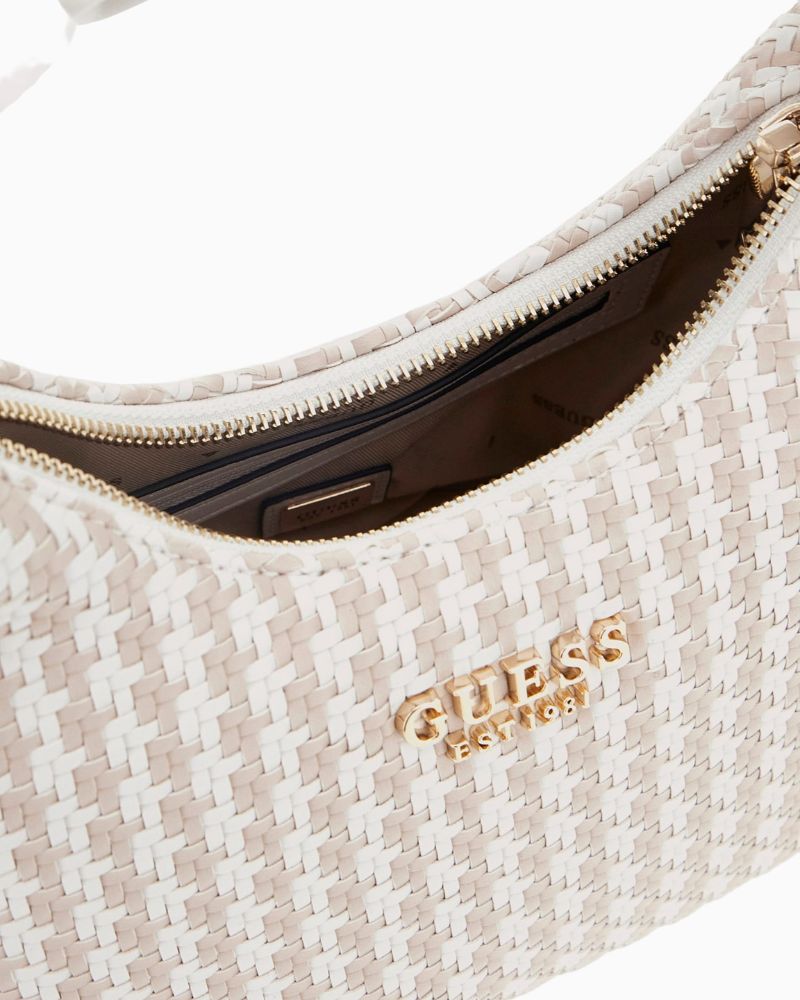 Interior of bag with personalised Guess logo lining