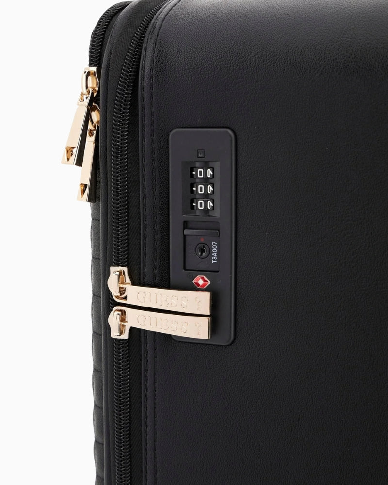 Close-up of logo detail on black Nadira travel luggage